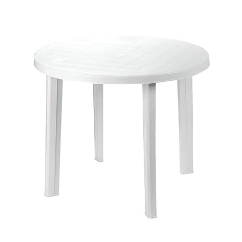 Table ronde blanche Greemotion en plastique avec trou pour parasol, installée dans une cour lumineuse.