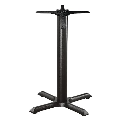 Pied de table central Bolero GD385 en fonte noire, avec pieds réglables, posé seul dans un intérieur lumineux.