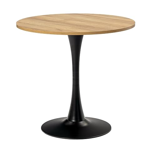 Table ronde compacte effet chêne avec piètement métallique noir évasé dans un intérieur lumineux