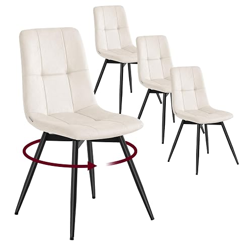 Quatre chaises de salle à manger en velours beige cappuccino autour d’une table ronde en bois