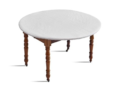 Protège-table rond blanc à relief géométrique, ajusté sur une table en bois naturel.