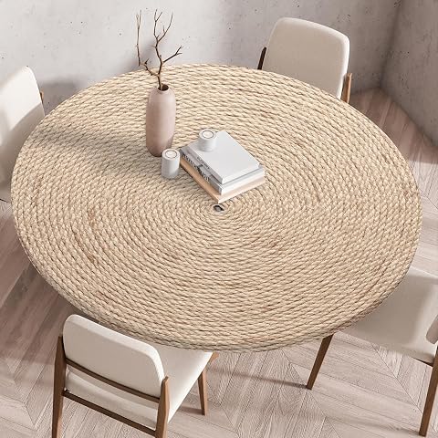 Nappe ronde Odot en polyester, avec bord élastique et motif d’inspiration naturelle sur une table en bois